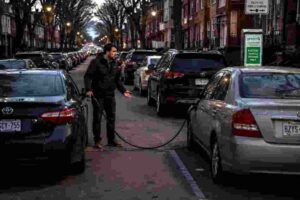 Toronto EV driver frustrated after non-electric vehicle blocks a Green P charging station on a crowded residential street.